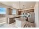 This contemporary kitchen features stainless steel appliances, granite countertops, and sleek cabinets with natural light at 2387 Bristol St, Superior, CO 80027