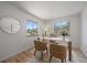 Bright home office with large windows, contemporary decor, and stylish accent furniture at 1018 Kelly Pl, Longmont, CO 80501