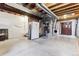 Unfinished basement with exposed ducts, white walls, concrete flooring, and laundry hookups at 4241 Brookwood Pl, Highlands Ranch, CO 80130