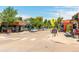 Residential street with parked cars and pedestrians at 4430 W 35Th Ave # 6, Denver, CO 80212