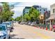 Residential street with shops and parked cars at 4430 W 35Th Ave # 6, Denver, CO 80212