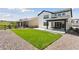 Spacious backyard with lush green lawn, patio, and fencing at 81 Simmental Loop, Castle Rock, CO 80104