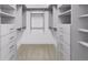 Spacious walk-in closet featuring custom shelving and ample storage space at 81 Simmental Loop, Castle Rock, CO 80104