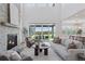 Open concept living room with large sliding doors leading to an outdoor space at 81 Simmental Loop, Castle Rock, CO 80104