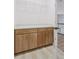 Mud room with built-in storage cabinets, countertop, and convenient hanging rack at 81 Simmental Loop, Castle Rock, CO 80104