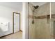 Bathroom showcases a tiled shower with glass door and neutral color scheme for a relaxing space at 9633 Fox Valley Dr, Morrison, CO 80465