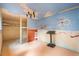 A quirky interior space, featuring unique painted walls, a modern light fixture, and minimal furnishings at 9633 Fox Valley Dr, Morrison, CO 80465