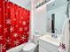 This is a bathroom with a tub and white cabinets at 13844 E Lehigh Ave # H, Aurora, CO 80014