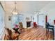 This living room has a fireplace, nice floors, and great natural light at 13844 E Lehigh Ave # H, Aurora, CO 80014