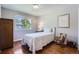 Bedroom with hardwood floors, a large window and neutral walls at 1607 Garnet St, Broomfield, CO 80020