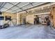 Spacious garage with bare drywall and ample space for parking and storage at 1607 Garnet St, Broomfield, CO 80020