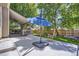 Spacious patio area surrounded by lush greenery, providing a serene outdoor retreat at 1607 Garnet St, Broomfield, CO 80020