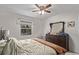 Bedroom featuring a large bed and ample natural light at 677 Vrain St # 10, Denver, CO 80204