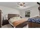 Cozy bedroom with a ceiling fan and a large window at 677 Vrain St # 10, Denver, CO 80204