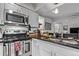 Well-equipped kitchen with stainless steel appliances and granite countertops at 677 Vrain St # 10, Denver, CO 80204