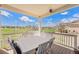 Inviting back porch with outdoor seating offers scenic views of the surrounding park and neighborhood at 1282 Eldorado Dr, Superior, CO 80027
