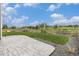 Backyard features a patio area, green lawn, a wooden fence, and landscaping at 1282 Eldorado Dr, Superior, CO 80027