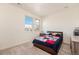 Bedroom with a queen-sized bed, a nightstand, and a dresser, bathed in natural light from two windows at 1282 Eldorado Dr, Superior, CO 80027