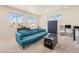 Bright living room featuring comfortable seating, stylish decor, and large windows offering ample natural light at 1282 Eldorado Dr, Superior, CO 80027