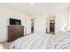 Spacious main bedroom featuring hardwood floors, walk-in closet, and modern accents for comfortable living at 1282 Eldorado Dr, Superior, CO 80027