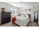 Simple bedroom with a double bed and plenty of storage at 6211 Leilani Ln, Castle Rock, CO 80108