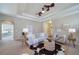 Aesthetic living room with ceiling fans, and modern furniture at 12340 Syracuse St, Thornton, CO 80602