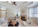 Inviting living room with a fireplace, neutral tones, and stylish decor at 12340 Syracuse St, Thornton, CO 80602