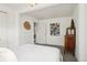 Bright bedroom featuring light gray carpet, white walls and natural light from the windows at 4883 Perry St, Denver, CO 80212