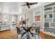 Stylish dining room with hardwood floors, modern lighting, and an open floor plan at 4883 Perry St, Denver, CO 80212