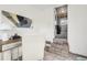 The sunroom features a large window with a desk and direct access to the laundry room at 4883 Perry St, Denver, CO 80212
