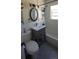 Cozy bathroom featuring subway tiles, a patterned floor, and a shower-tub combo for convenience at 1925 Joliet St, Aurora, CO 80010