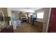 Spacious kitchen with stainless steel appliances, wood cabinets, and ample countertop space at 1925 Joliet St, Aurora, CO 80010