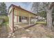 Backyard patio with covered seating area, great for enjoying outdoor living and entertaining guests at 2056 S Newark Way, Aurora, CO 80014