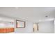 Basement space with wooden cabinets at 3335 S Verbena Ct, Denver, CO 80231