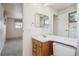 Bathroom with sink, toilet, and mirror at 3335 S Verbena Ct, Denver, CO 80231