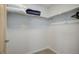 Walk-in closet with shelves and hanging space for optimal storage with plush towels and blankets at 1316 Snowberry Ln # 101, Louisville, CO 80027