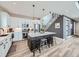 Beautiful kitchen featuring a central island with bar stool seating, modern appliances, and ample countertop space at 938 Larkspur Ln, Louisville, CO 80027