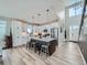 Modern kitchen with stainless steel appliances, an expansive center island, and an open layout perfect for entertaining at 938 Larkspur Ln, Louisville, CO 80027