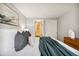 Serene bedroom with a comfortable bed, closet and soft lighting, creating a relaxing atmosphere at 1390 N Emerson St # 106, Denver, CO 80218