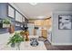 Inviting kitchen area with wooden cabinets, modern appliances, and dining space at 1390 N Emerson St # 106, Denver, CO 80218