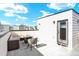 Relax on the rooftop patio and enjoy a barbecue or time around the firepit with views of the neighborhood at 11205 W 53Rd Ln, Arvada, CO 80002