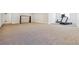 Spacious recreation room with carpeted floors featuring exercise equipment and room for other activities at 1280 Gentle Rain Dr, Castle Rock, CO 80109