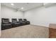 Home theater room boasts four leather recliners and projector, perfect for entertaining at 1280 Gentle Rain Dr, Castle Rock, CO 80109