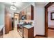 Well-maintained kitchen with stainless steel appliances, wood cabinetry, and light countertops at 125 E 11Th Ave # 2, Denver, CO 80203