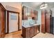 Classic kitchen equipped with wood cabinets, and stainless steel appliances at 125 E 11Th Ave # 2, Denver, CO 80203