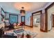 Inviting living room with a comfortable leather sofa, stylish rug, and seamless access to the cozy bedroom space at 125 E 11Th Ave # 2, Denver, CO 80203