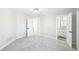 Bright bedroom features neutral paint and plush carpet; bathroom and closet are accessible from here at 5352 Brookside Dr, Broomfield, CO 80020