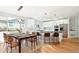 Bright kitchen with a modern island, marble countertops, and stainless steel appliances at 5352 Brookside Dr, Broomfield, CO 80020