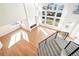 Aerial view of a sun-filled living room with a modern staircase and fireplace at 5352 Brookside Dr, Broomfield, CO 80020