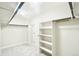 Spacious walk-in closet with ample storage space and shelving at 5352 Brookside Dr, Broomfield, CO 80020